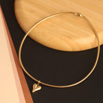 Load image into Gallery viewer, Sleek Golden Curved Heart Pendant Snake Chain Choker