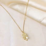 Load image into Gallery viewer, Gold Leaf Necklace with Pearl Accent