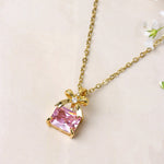 Load image into Gallery viewer, Pink Gemstone Bow Pendant Necklace