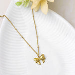 Load image into Gallery viewer, Gold Bow Pendant Necklace