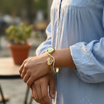 Load image into Gallery viewer, Dual Heart Evil Eye Charm Bangle – Premium Anti-Tarnish Bracelet