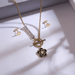 Load image into Gallery viewer, Black Enamel Floral Pendant Necklace & Cloud Stud Earrings Set