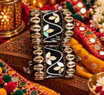 Load image into Gallery viewer, Black Gold Cowrie Leaf Mirror Cuff
