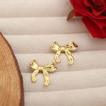 Load image into Gallery viewer, golden-bow-charm-stud-earrings-ser-238
