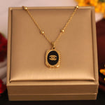 Load image into Gallery viewer, Luxe Black Emblem Pendant Necklace Anti-Tarnish Gold
