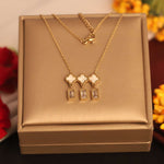 Load image into Gallery viewer, Golden Triple Clover &amp; Crystal Drop Necklace
