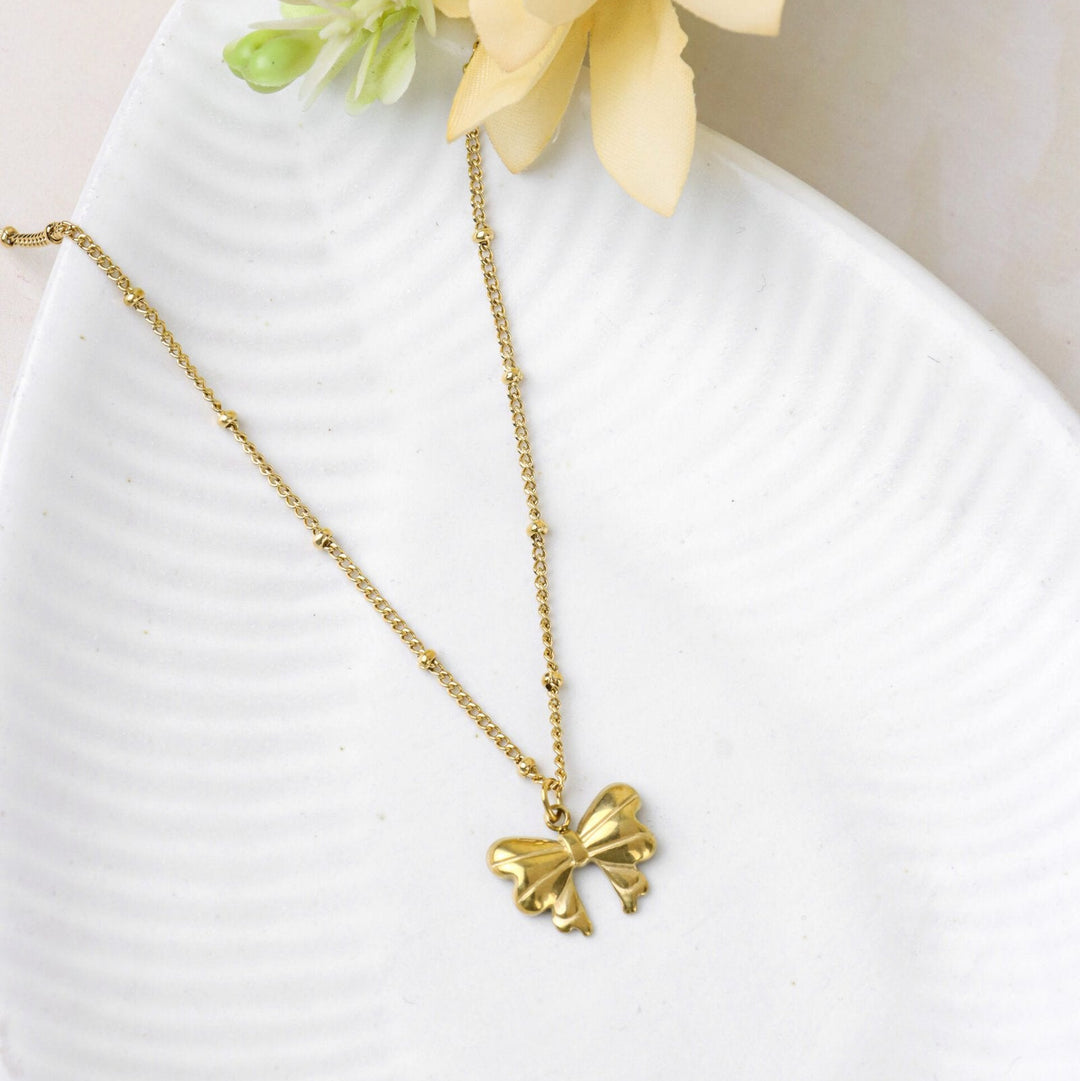 Gold Bow Pendant Necklace
