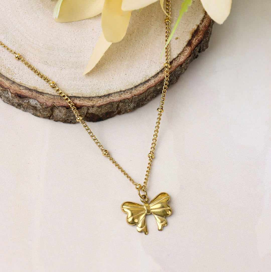 Gold Bow Pendant Necklace