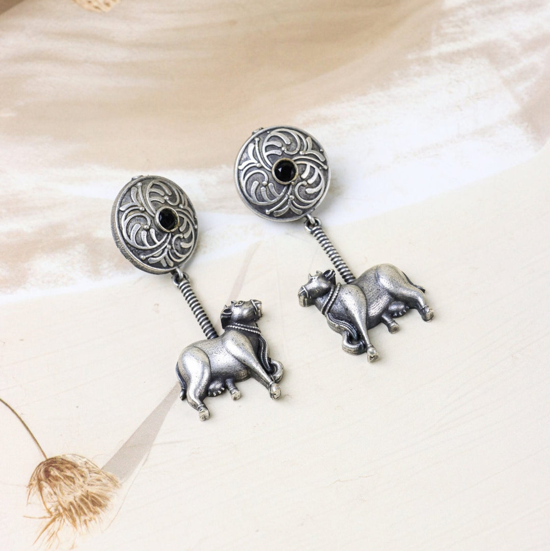 Black Stone Earrings with Cow Motif Dangle