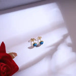 Load image into Gallery viewer, Golden Sunburst &amp; Star Charm Necklace Set with Blue Beads
