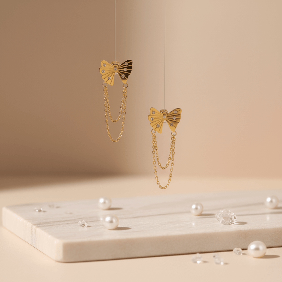 golden-bow-chain-drop-earrings-ser-362