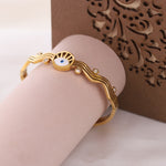 Load image into Gallery viewer, Evil Eye Wave Charm Bangle – Anti Tarnish Gold Plated
