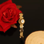 Load image into Gallery viewer, Evil Eye Wave Charm Bangle – Anti Tarnish Gold Plated
