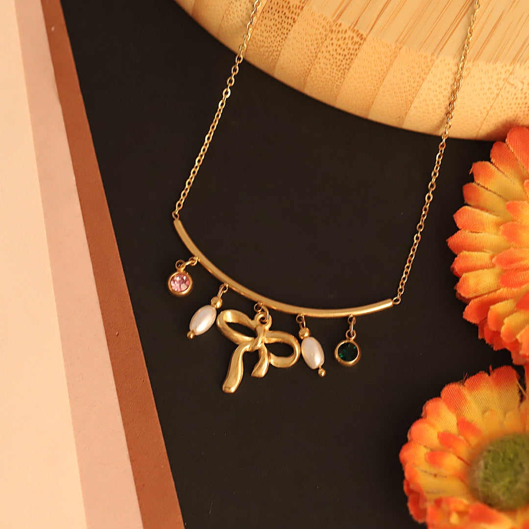 Elegant Bow Charm Necklace with Pearl & Crystal Drops