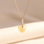 Load image into Gallery viewer, Pearl-Leaf Engraved Heart Pendant Necklace – Anti-Tarnish Gold
