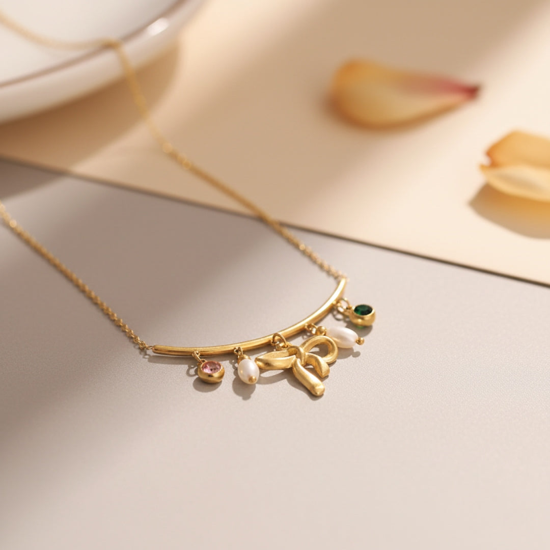 Elegant Bow Charm Necklace with Pearl & Crystal Drops