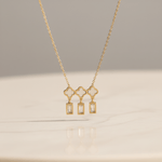 Load image into Gallery viewer, Golden Triple Clover &amp; Crystal Drop Necklace
